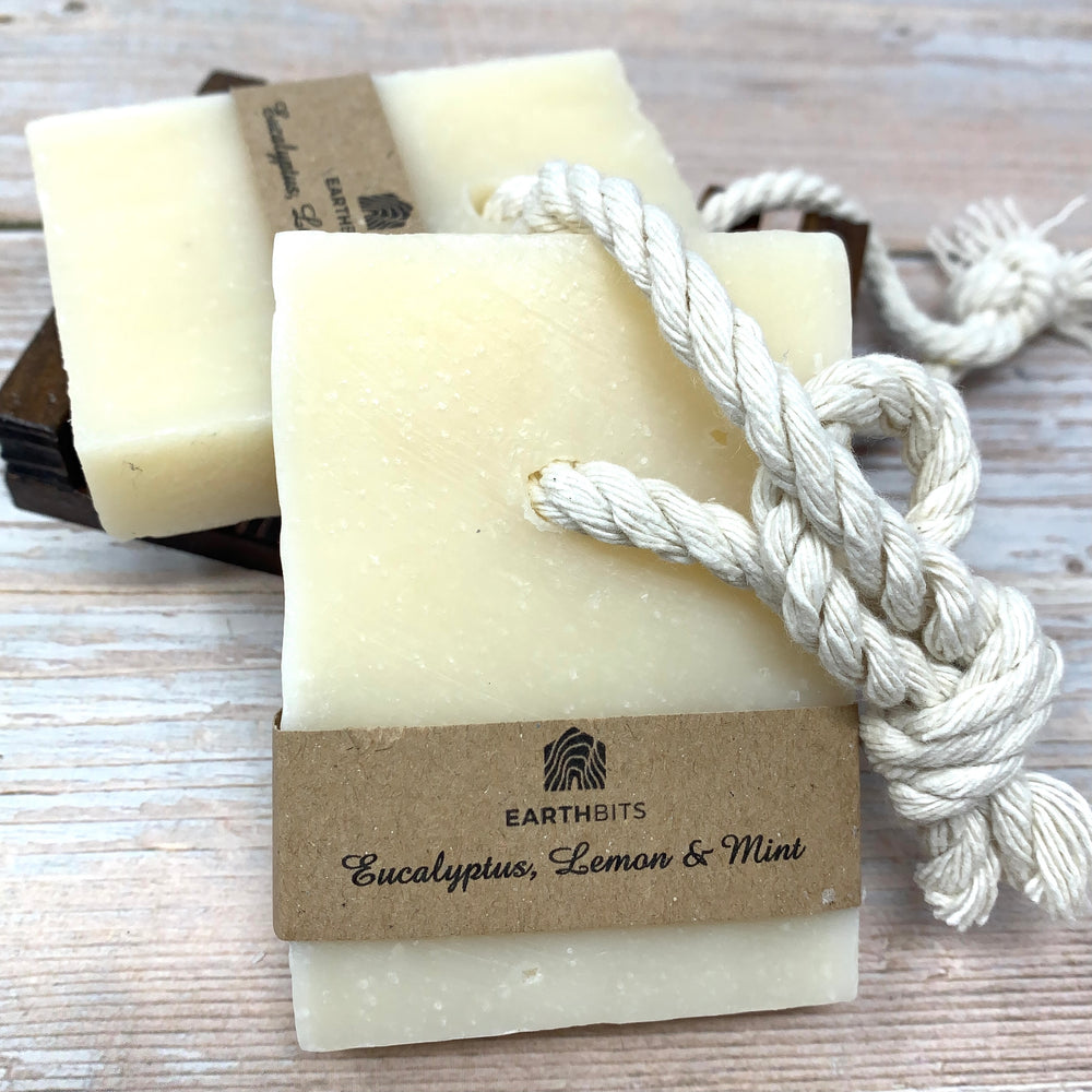 lemon mint soap on rope with brown paper label and white string to hang soap in shower