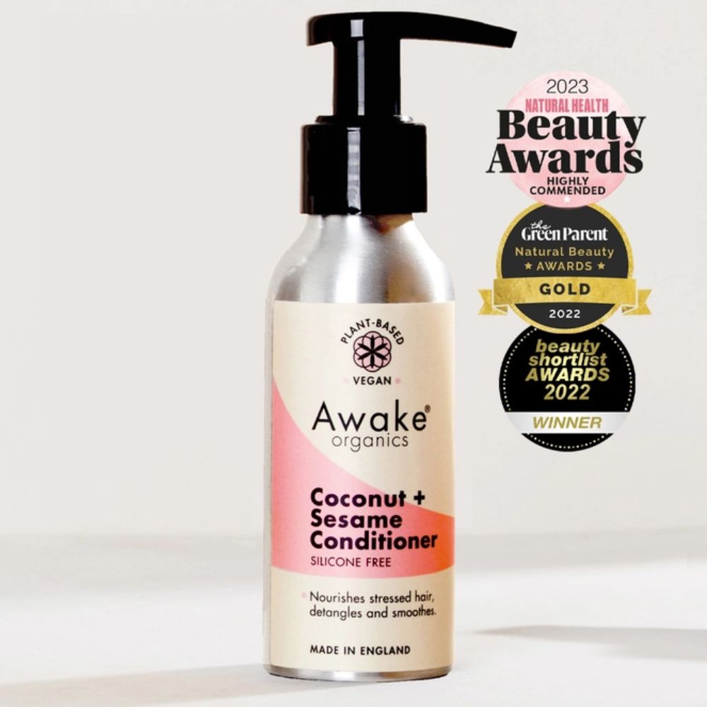 awake conditioner for hair growth in metal bottle and reusable pump