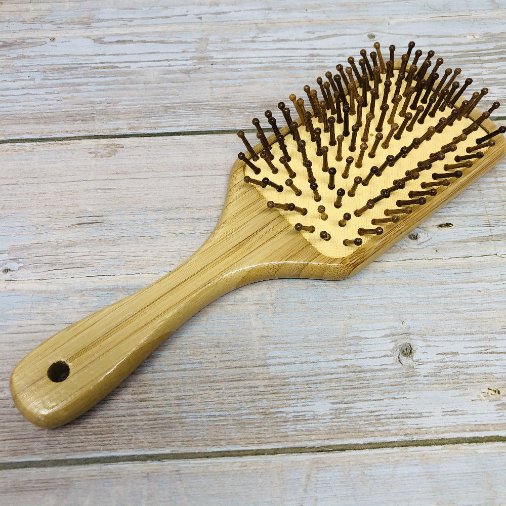 paddle hair brush made with bamboo and natural rubber