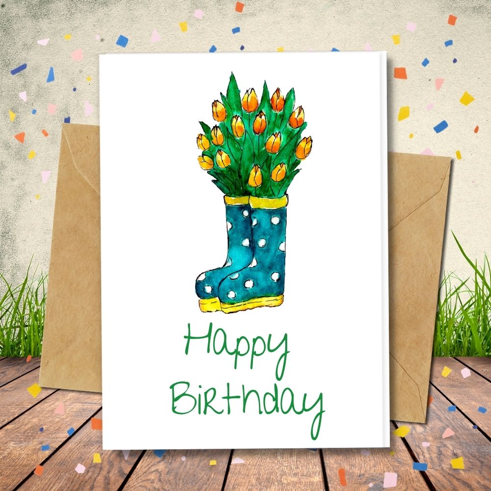 handmade birthday card with cute design of boots in flowers made of different kind of eco friendly papers