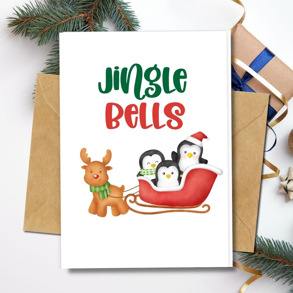 eco friendly handmade christmas cards, jingle bells design with reindeer and penguin in slay