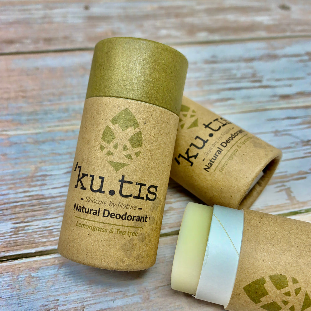 natural deodorant in cardboard tube by kutis, green and brown container and open deodorant with lemongrass and tea tree formula