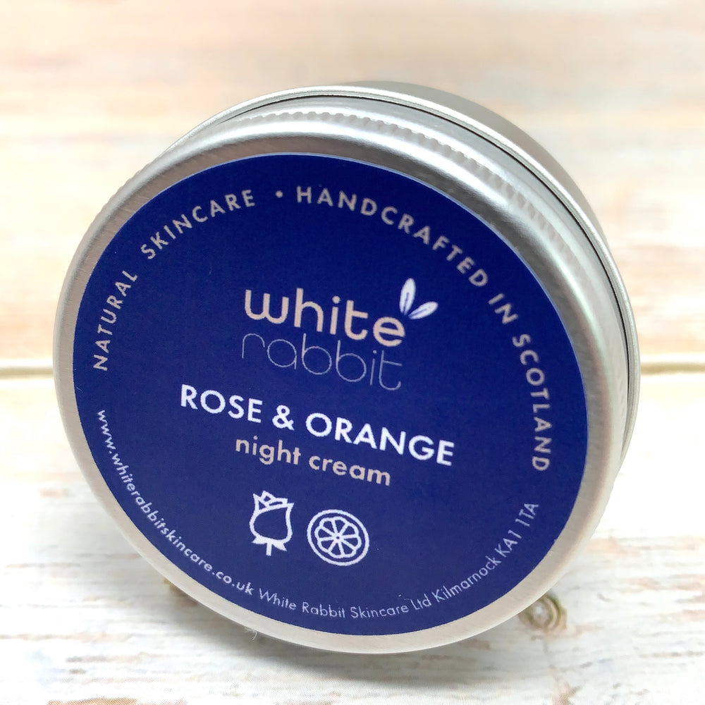 small travel pot in aluminium container of vegan night cream by white rabbit with orange and rose