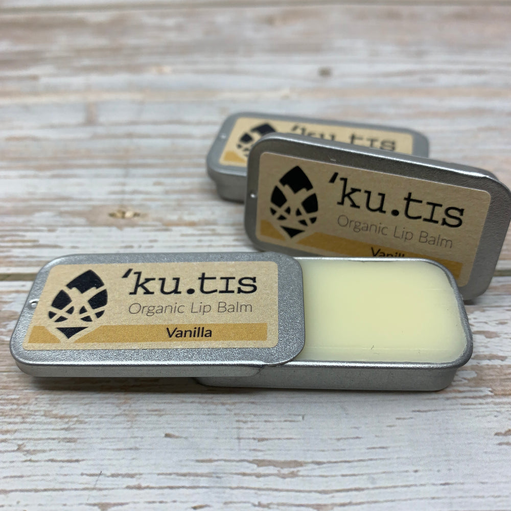 kutis lip balms made with organic beeswax and in slider metal tin