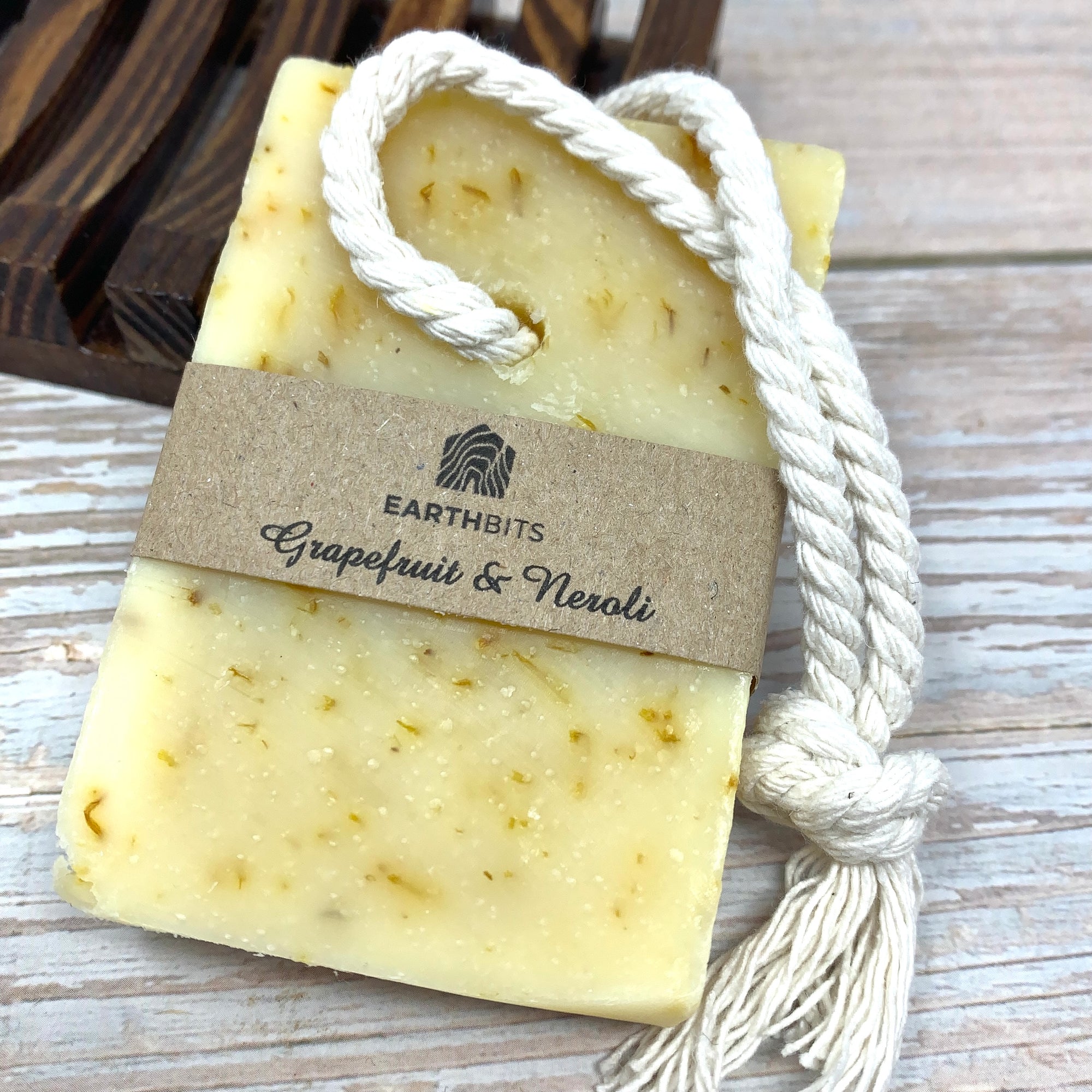 grapefruit and neroli soap on a rope with brown label and white cotton rope by earthbits