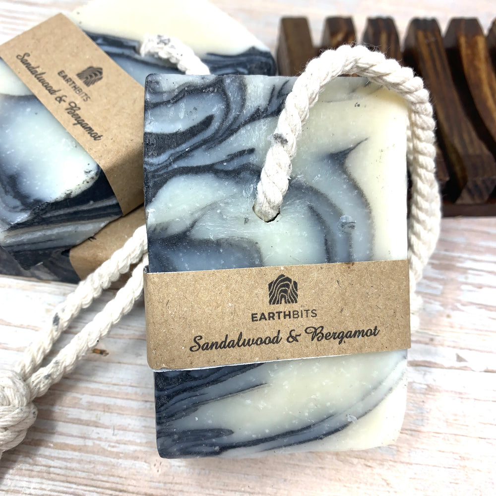 vegan soap on a rope made with organic sandalwood and bergamot in blue and white colour and white rope to hang on shower by earthbits