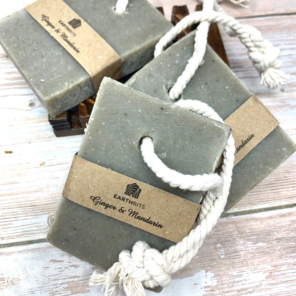 vegan organic soap on rope bars in dark green ginger and mandarin scent with brown paper label and plastic free packaging